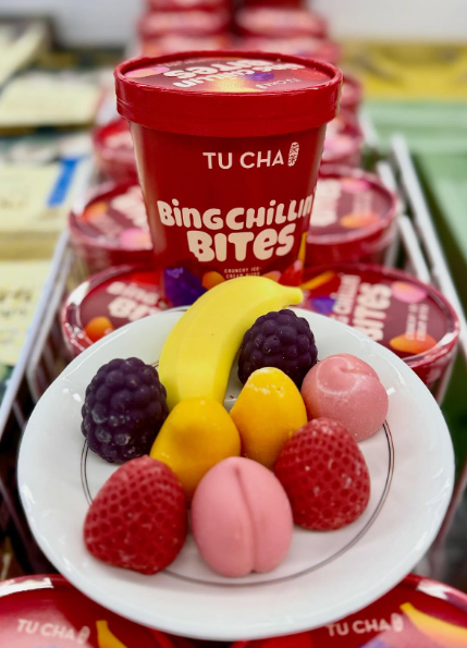 Assorted Bing Chillin’ Bites served in front of TuCha packs in a freezer display